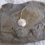 Silver Taurus pendant: The ..