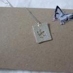 Silver Frog Pendant: A text..
