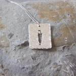 Stalking cat pendant: A cat..