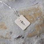Stalking cat pendant: A cat..