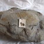 Silver rabbit pendant: The ..