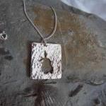 Silver rabbit pendant : A C..