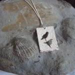 Silver Birds pendant: A bea..