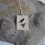 Silver Birds pendant: A bea..