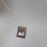 Silver rabbit pendant: The ..