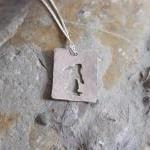 Silver rabbit pendant: A Cu..