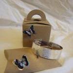 Silver textured bracelet wi..