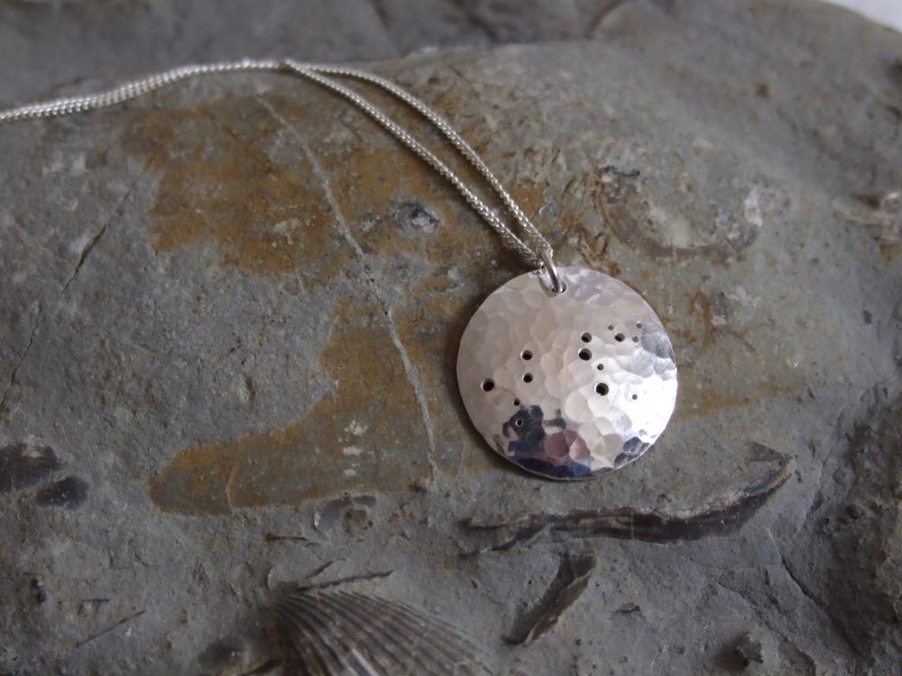 Silver Leo pendant: The constellation of Leo on a textured sterling silver pendant