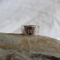 G.O.T. Silver Ring: Winter is Coming is hand stamped on a sterling silver ring which has also been hammered for texture.