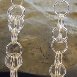 Silver Byzantine earrings: A pair of sterling silver byzantine chain maile earrings with each link soldered.